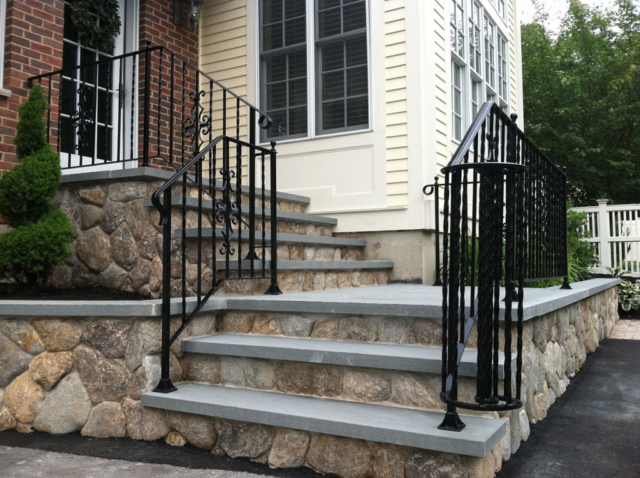 Natural stone steps leading to house entrance