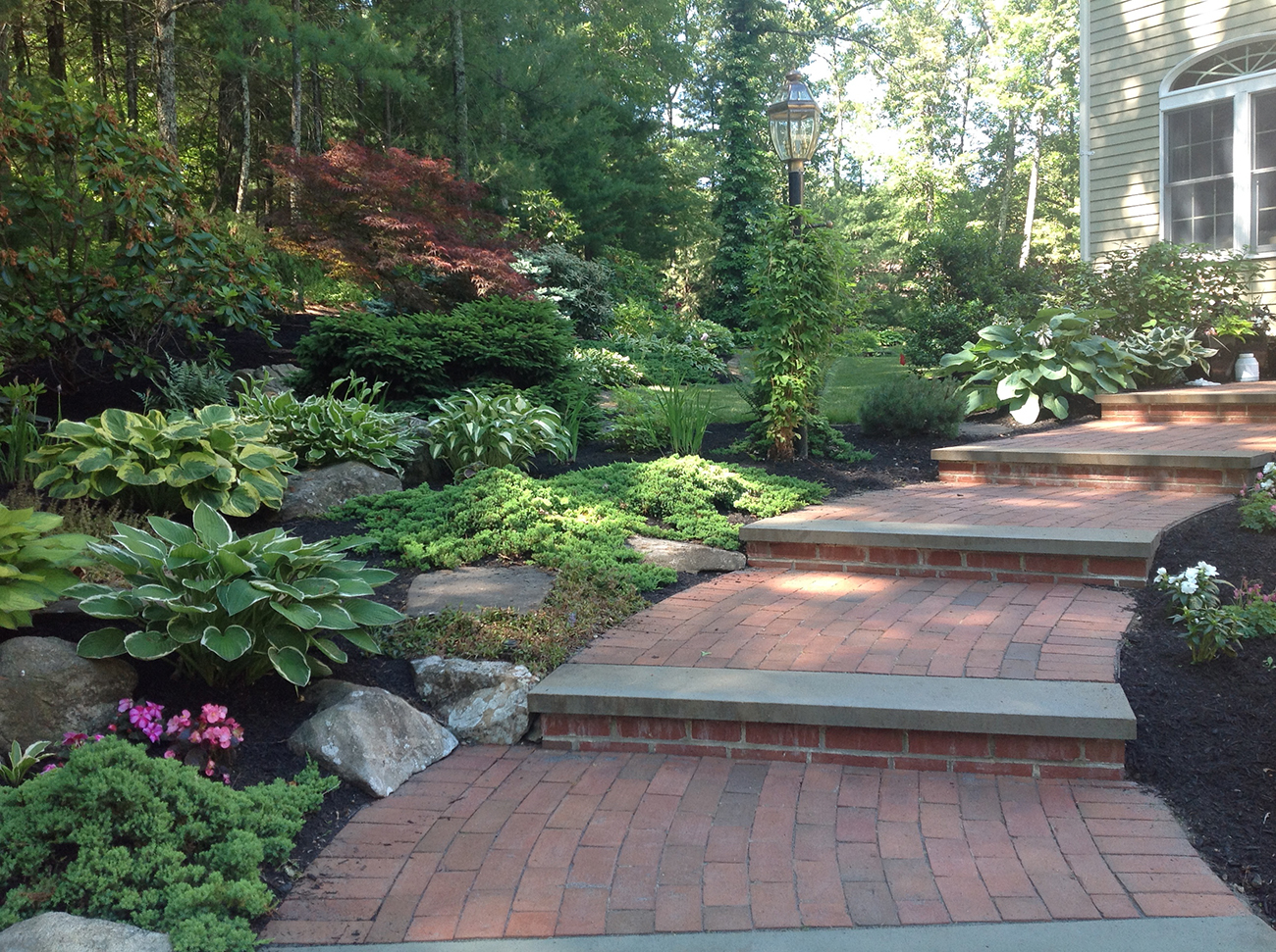 Natural Stone steps and wall as part of landscaping
