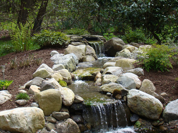 Water Feature with Stream bordered by Rocks